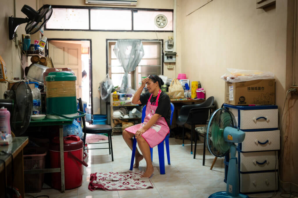 Chaninporn Duangnguen, a market trader, is resting inside her house in Bangkok, Thailand, on May 8, 2025.